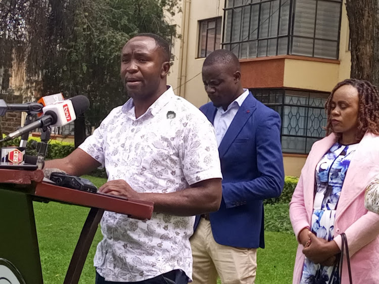 The Kenya Union of Clinical Officers SG George Gibore reads the joint statement on behalf of other health unions in Nairobi on May 14, 2023