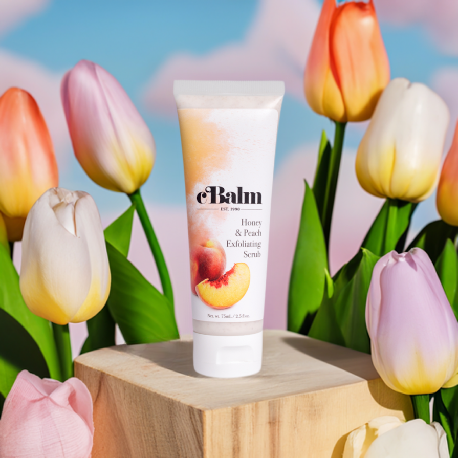 um tubo de produto para a pele cercado por tulipas