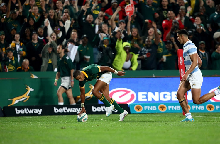 Manie Libbok of the Springboks scores a try against Argentina during their rugby championship clash at Emirates Airline Park.