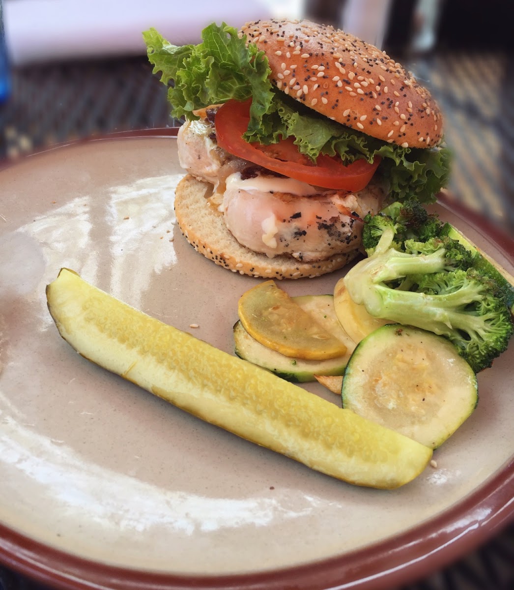 Grilled chicken & Brie sandwich topped with apple marmalade with fresh seasonal vegetables and a very good quality gluten free bun... delicious