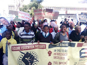 A group of pupils protest outside department of education offices in Pretoria on Tuesday, June 18 2019.