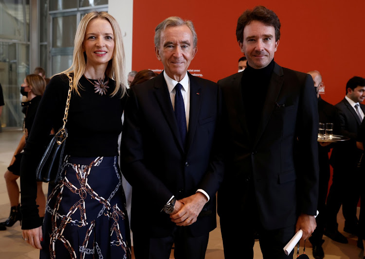 Head of LVMH luxury group Bernard Arnault, his daughter Delphine Arnault and his son Antoine Arnault attend the exhibition 'The Morozov Collection, Icons of Modern Art' at Foundation Louis Vuitton in Paris, France - Yoan Valat/Pool via REUTERS