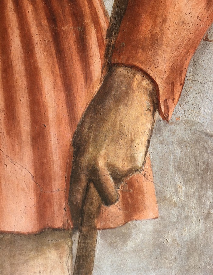 Masaccio, Il Pagamento del Tributo, particolare mano del gabelliere, affresco nella Cappella Brancacci, Santa Maria del Carmine, Firenze