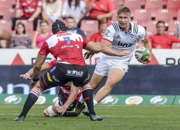 Jack Goodhue of the Crusaders with possession during the Super Rugby match between Emirates Lions and Crusaders at Emirates Airline Park on April 01, 2018 in Johannesburg, South Africa.