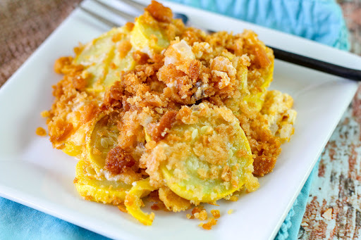 A serving of squash casserole on a plate.