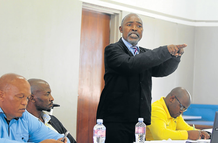 Contralesa provincial chairman Chief Mwelo Nonkonyana discusses forming a new political party. At the meeting are, from left, Contralesa secretary-general Chief Xolile Ndevu, AmaXhosa King Mpendulo Sigcawu and, right, provincial secretary Chief Mkhanyiseli Dudumayo.