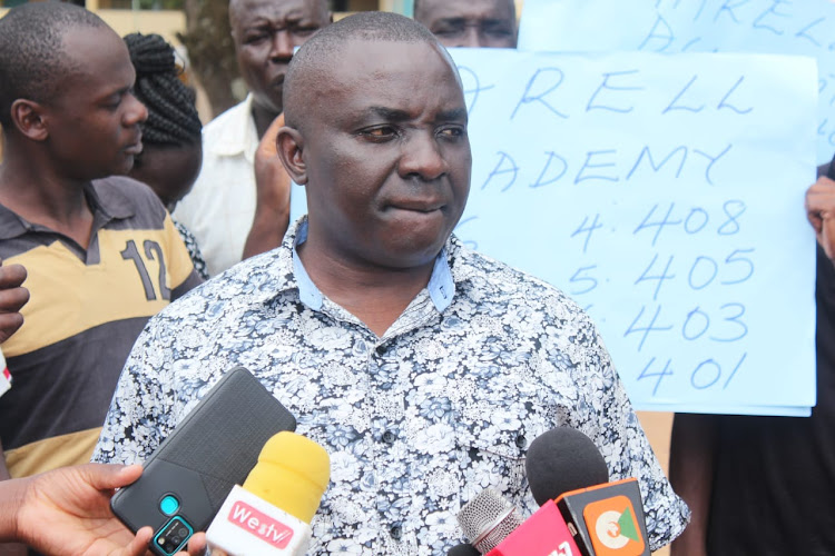 David Kang'o, the Chief Principal of Marell schools addressing the press at the school premises on November,23,2023.