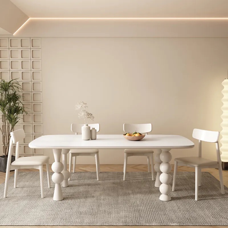 White sintered stone dining table with steel legs