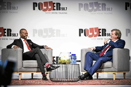 The writer says it's absurd to suggest that billionaire Johann Rupert, above with Given Mkhari, was out to insult black people on 'Chairman's Conversation' on Power FM on Tuesday night.