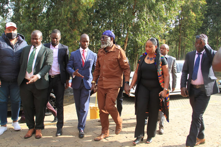 Roots party presidential candidate George Wajackoyah, his wife Meller Luchiri and team arriving for presidential debate at CUEA on Tuesday, July 26,2022.