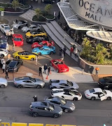 Three supercars were damaged after a SUV hit a Porsche outside Oceans Mall in Durban on Sunday. 