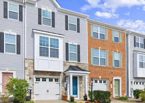 Facade of modern townhouses with garages in this luxury property for sale in Capitol Heights ($459,500)