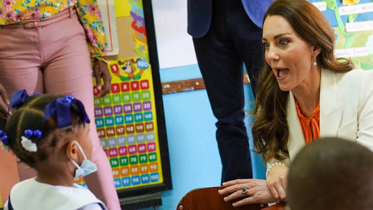 The Duchess of Cambridge spoke with pupils at Shortwood Teacher"s College in Kingston