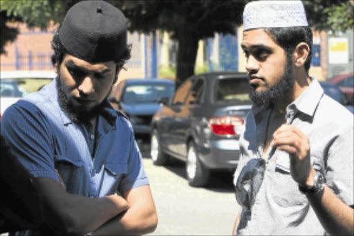 CONCERNED: Mohamed Farhan Kazi and his brother Mohmed Nuaman Kazi outside the Krugersdorp Magistrate's Court. PHOTO: MABUTI KALI