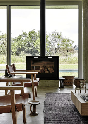 The wood and leather chairs in the living area are a local take on the classic Danish mid-century Spanish chair by Borge Morgensen.