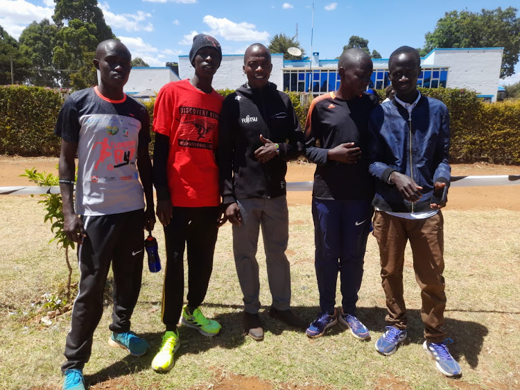 Charles Lokir Katul and his friends during the Discovery Cross country championships in Eldoret. He said he wants to finish on the podium at the Sirikwa Classic Cross country on Saturday after finish 5th last year.