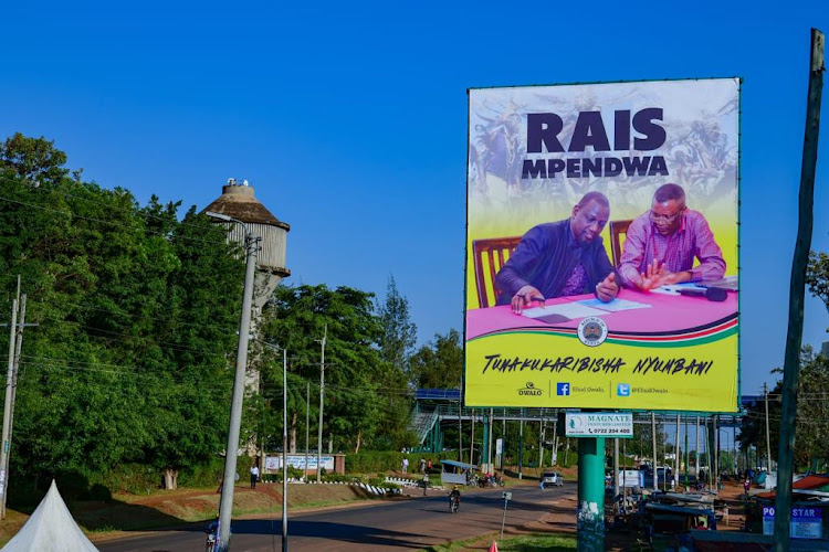 A billboard welcoming President William Ruto to Siaya County outside the Jaramogi Oginga Odinga University of Science and Technology main entrance. Image: Eliud Owalo/Twitter