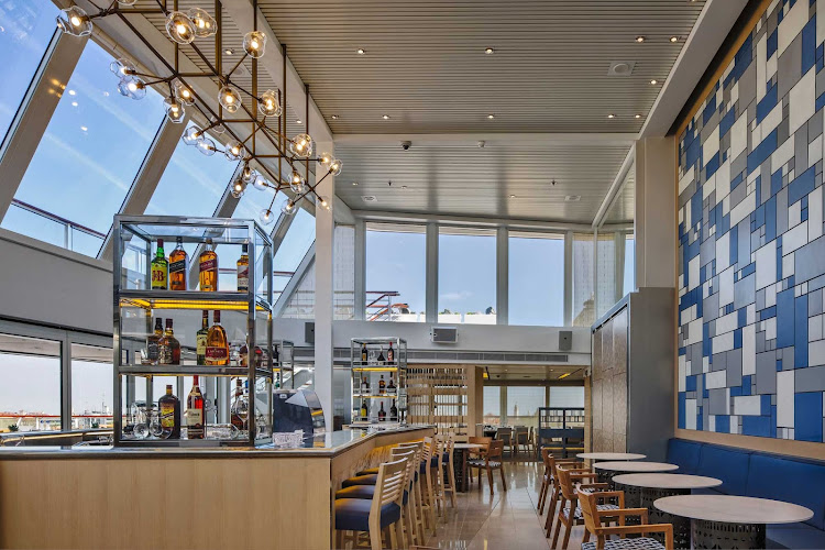 At the end of the day, meet old friends and new at the Aquavit Terrace Bar on Viking Star.