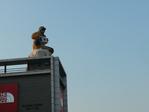 Man on Building Sculpture