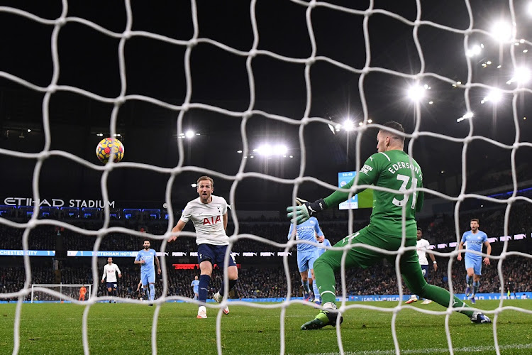 Harry Kane of Tottenham Hotspur scores their second goal in the Premier League match against Manchester City at Etihad Stadium in Manchester on February 19 2022.