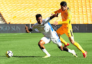 James Okwuosa of Chippa and  Leonardo Castro of  Chiefs  tussle for the ball during the PSL match  at FNB Stadium last night.   