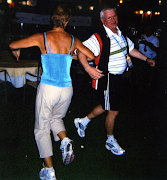 Ian Harries celebrates Mbulaeni Mulaudzi's Olympic silver medal by dancing Zorba the Greek at his hotel's rooftop bar. 