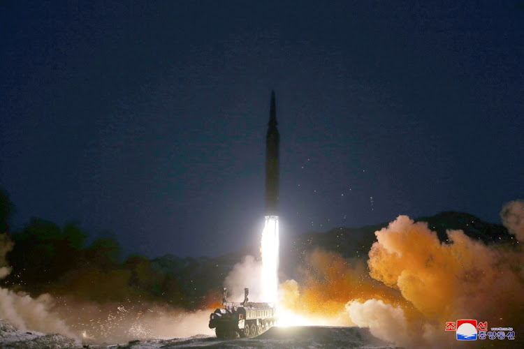 A missile is launched during what state media report is a hypersonic missile test at an undisclosed location in North Korea, January 11, 2022.