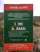 A safety sign on Table Mountain National Park's high-risk trails. An alleged mugger fell to his death while fleeing after being pepper-sprayed by one of his hiker victims near Camps Bay. File photo.