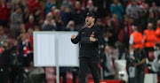 Jurgen Klopp the head coach / manager of Liverpool celebrates the 302 victory during the UEFA Champions League group B match between Liverpool FC and AC Milan at Anfield on September 15, 2021 in Liverpool, United Kingdom. 