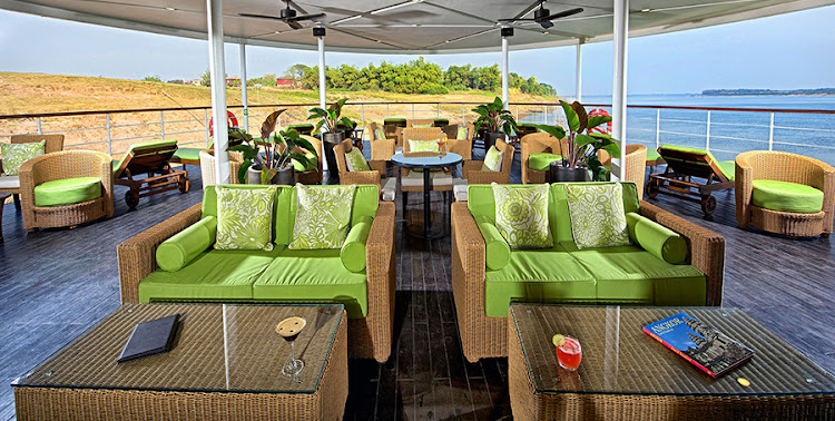 Premium lounge chairs on Avalon Siem Reap's open-air Observation Lounge.