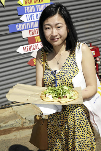 A satisfied customer at Cape Town's Visa Street Food Festival.