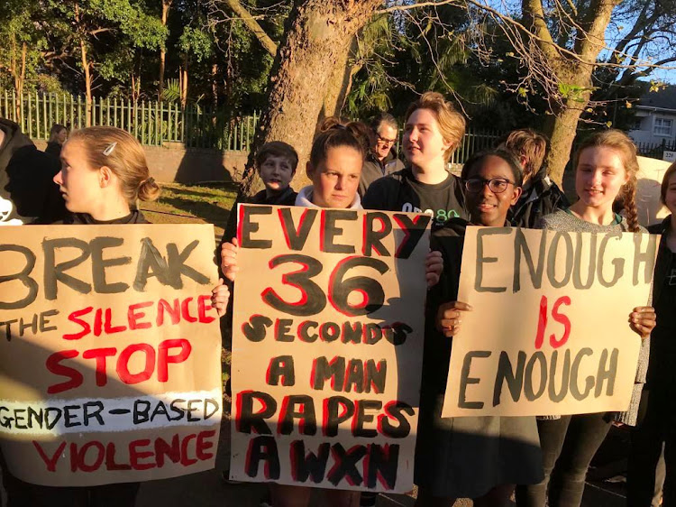 Pupils at Westerford High School in Cape Town demonstrate against gender violence on M ain Road in Newlands on September 5 2019.