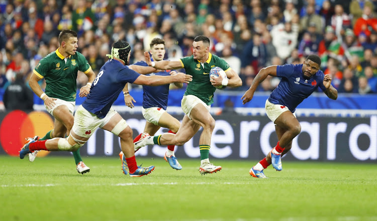 Jesse Kriel hands off France's Gregory Alldritt during the quarter final match between France. Picture: STEVE HAAG