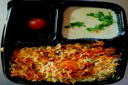 Chicken Biryani + Raita + Gravy + Salad + Gulab Jamun