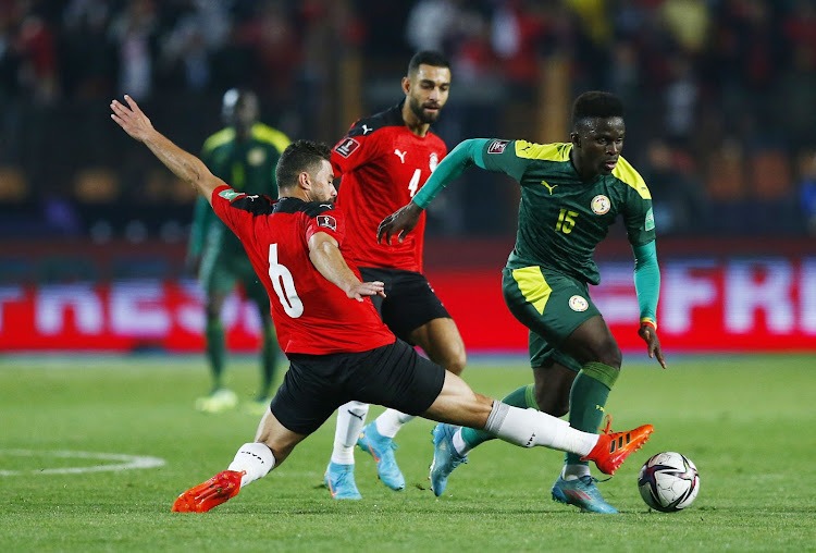 Egypt's Yasser Ibrahim in action with Senegal's Bamba Dieng REUTERS/Amr Abdallah Dalsh