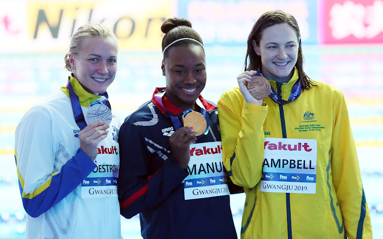 Gold medallist Simone Manuel of the US, silver medallist Sarah Sjoestroem of Sweden and bronze medallist Cate Campbell of Australia pose.