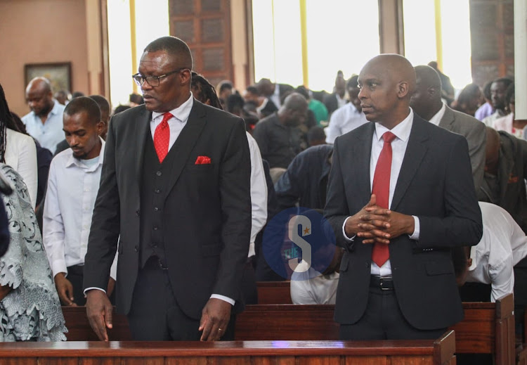 Communication Authority Director General David Mugonyi with ICT CS Eliud during the late journalist Rita Tinina's during the requim mass at Holy Family Basilica, Nairobi, on March 25, 2024