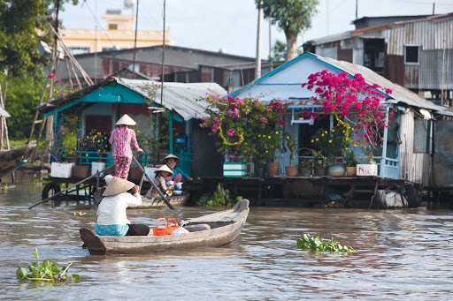 Villagers going about their daily lives in Châu Đốc, Vietnam, along the border with Cambodia.