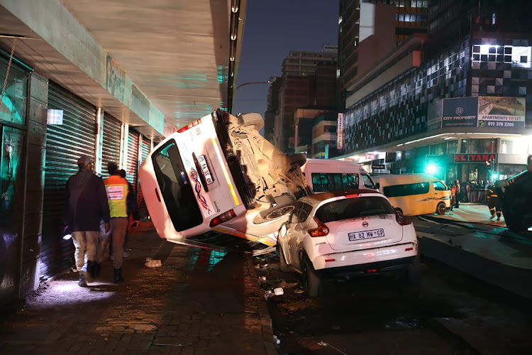 A trail of destruction on Bree, Rissik and Joubert streets in Johannesburg after an explosion caused a massive fissure which overturned vehicles.