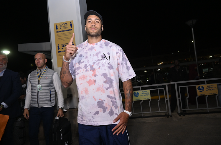 Olympic 100m champion Lamont Marcell Jacobs poses on arrival at JKIA for Saturday's Kip Keino Classic