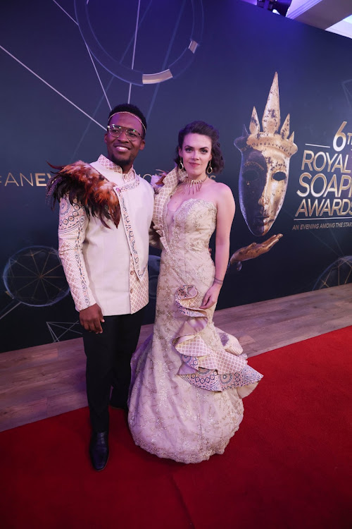 Nyaniso Dzedze and his wife Yana pose for a portrait on the red carpet, 11 March 2023, in Sandton, Johannesburg, during the 6th Royalty Soapie awards. Picture: Alaister Russell