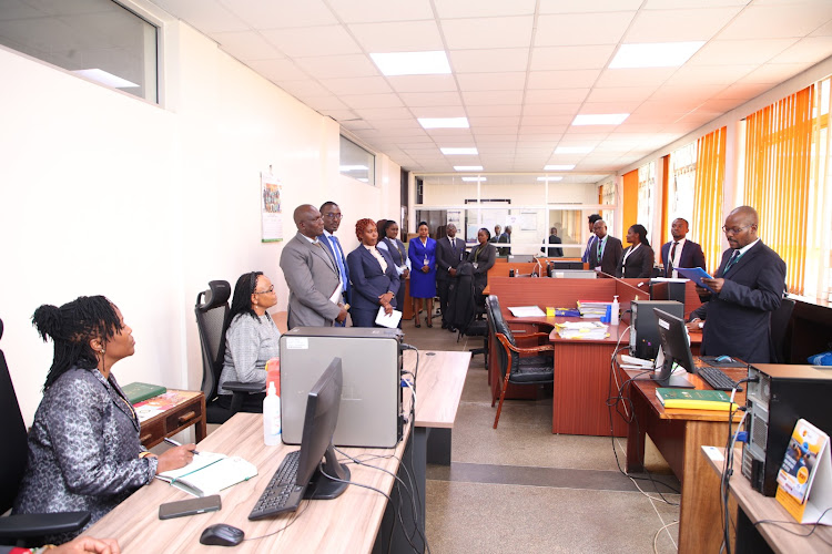 Chief Justice Martha Koome with Chief Registrar Frida Mokaya and other judicial officers at Milimani Anti-Corruption Court on April 9, 2024.