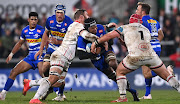 Marvin Orie of the Stormers is tackled by Duane Vermeulen of Ulster during the United Rugby Championship match in Belfast, Northern Ireland. 