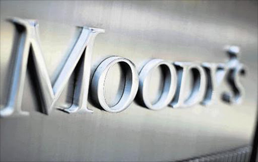 Moody's Investors Service Inc. signage is displayed outside of the company's headquarters in New York, U.S., on Friday, Sept. 30, 2011. Moody's Investors Service, Standard and Poor's and Fitch Ratings are the largest of 10 firms approved by the SEC to assign credit rankings.