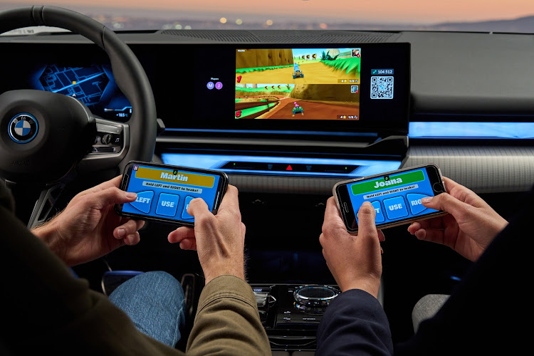 For the in-car gaming experience, players use the BMW Curved Display infotainment screen, using their smartphone as a controller.