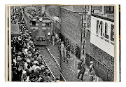 'Africans throng a Johannesburg station platform during late afternoon rush hour,'  Ernest Cole captioned this photo in 'House of Bondage'.