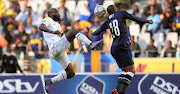 Mogamat May of Cape Town City is challenged by Makhehleni Makhaula of AmaZulu during the DStv Premiership 2021/22 game between Cape Town City and AmaZulu at Cape Town Stadium.