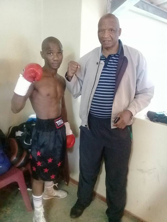 A boxer Sinethemba Magibisela (L) was stabbed to death during a robbery on 25 September 2017, a day after he had won a six-round match.