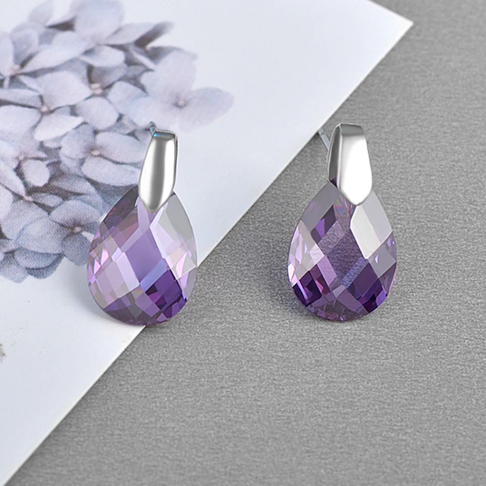 Boucles d'oreilles en forme de goutte d'améthyste élégantes et tendance pour femmes. Un accessoire parfait pour rehausser votre style avec raffinement.