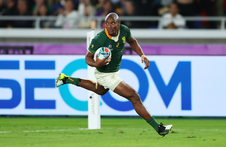 DAUNTING THREAT: Makazole Mapimpi crosses to score SA's first try against England during the Rugby World Cup on November 2 2019, at International Stadium Yokohama, Kanagawa, Japan. SA's world champions, and all professional rugby players, now face a more daunting battle against the economic effects of Covid-19 on the sport